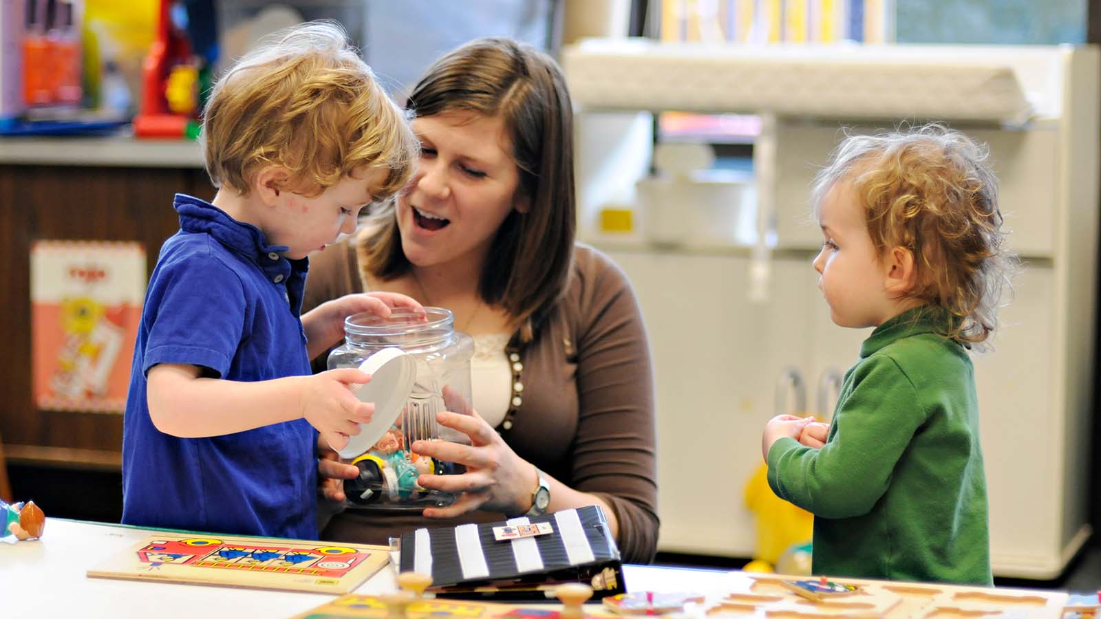 Teacher working with preschool students