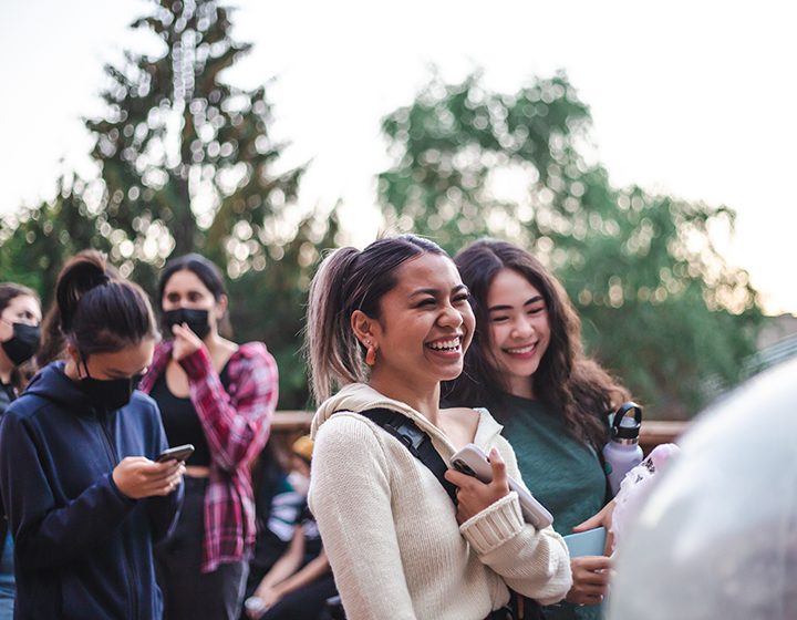 Group of students laughing together