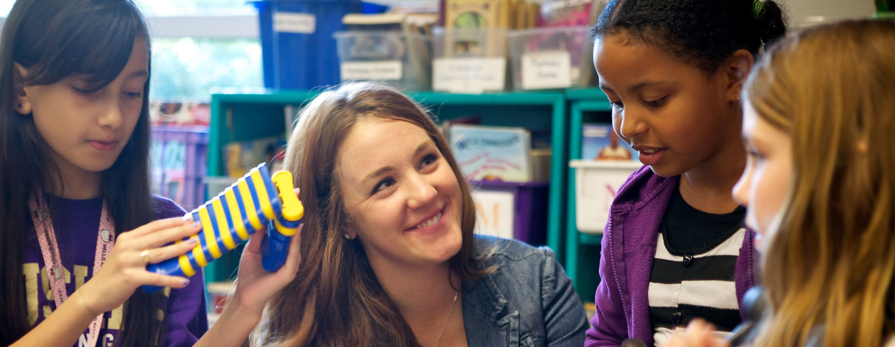 EdPol student working with children in a school