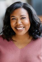 A portrait of Melyssa Stone smiling