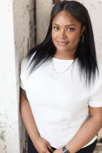 A headshot of Ebony Moxey