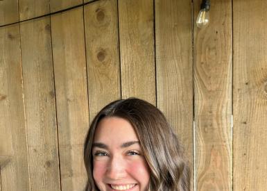 A headshot of Hailey Capps